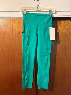 Lululemon Fast Free HR Crop 23” Nulux Pockets Size 4 Kelly Green
